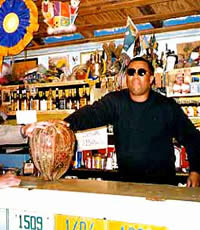 Vic-Hum proprietor with world's largest coconut